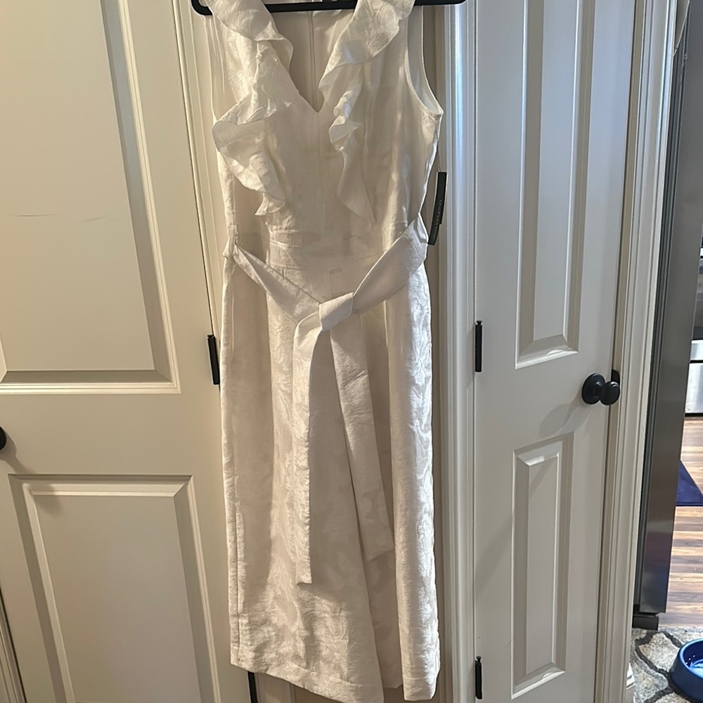 Eva Longoria Elegant White Sleeveless Wide Leg Cropped Jumpsuit